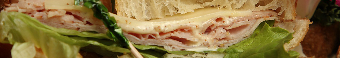 Eating Sandwich Bakery at Wheatfields Bakery Cafe restaurant in Lawrence, KS.